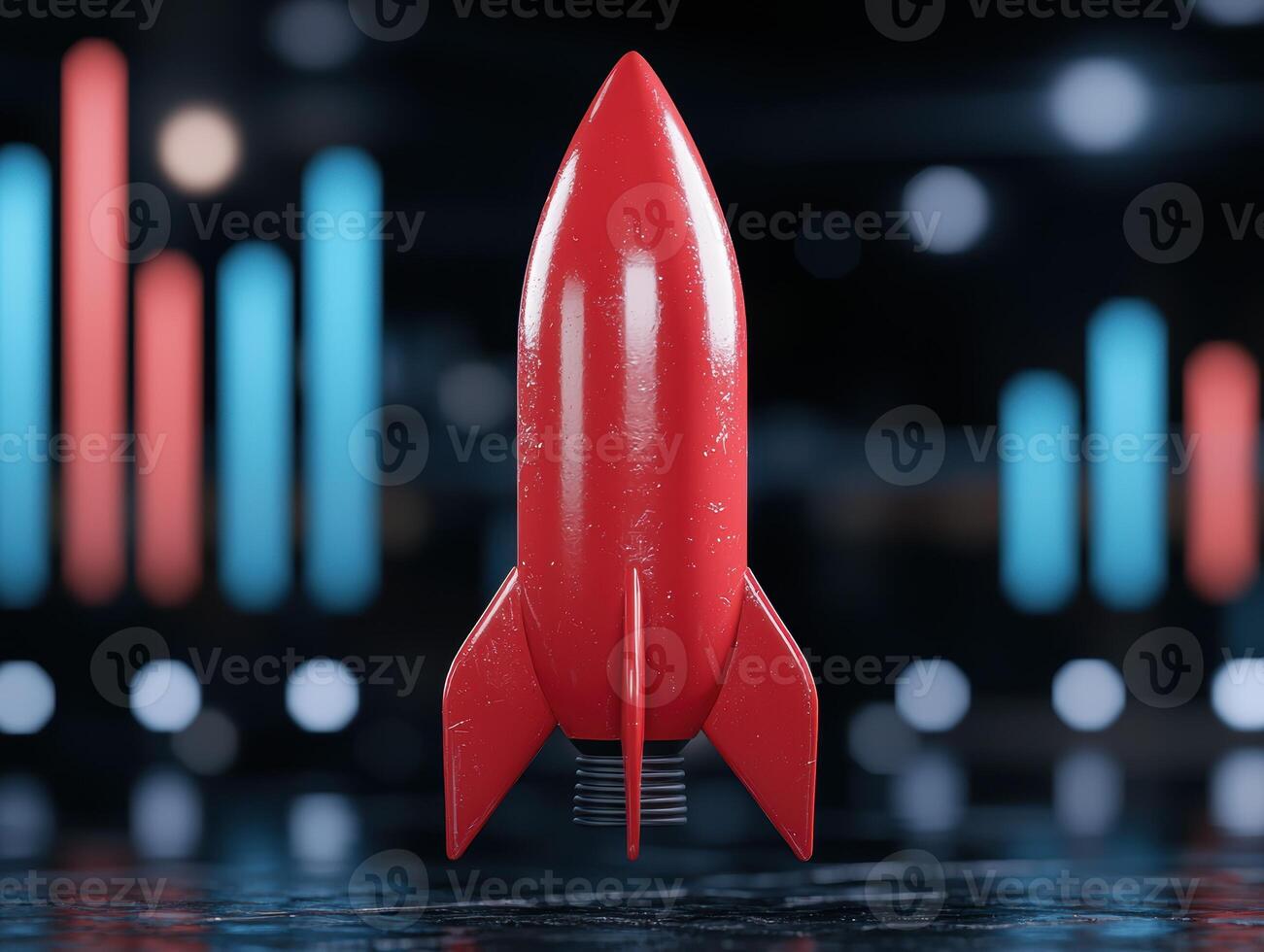 Bright red toy rocket on dark background photo