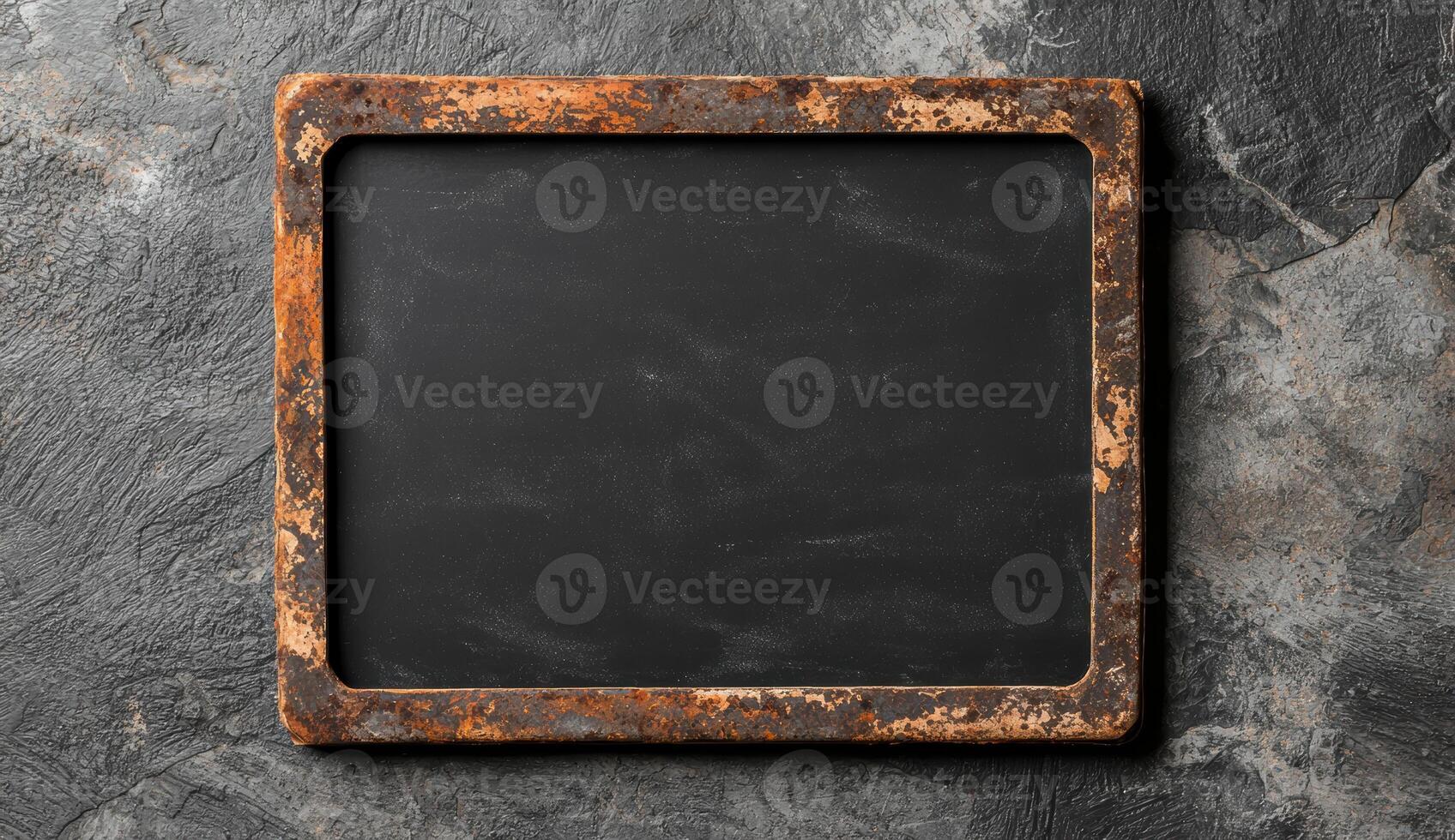 rustic chalkboard frame on dark background photo