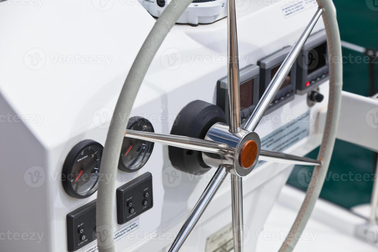 Sailing yacht control wheel and implement. photo