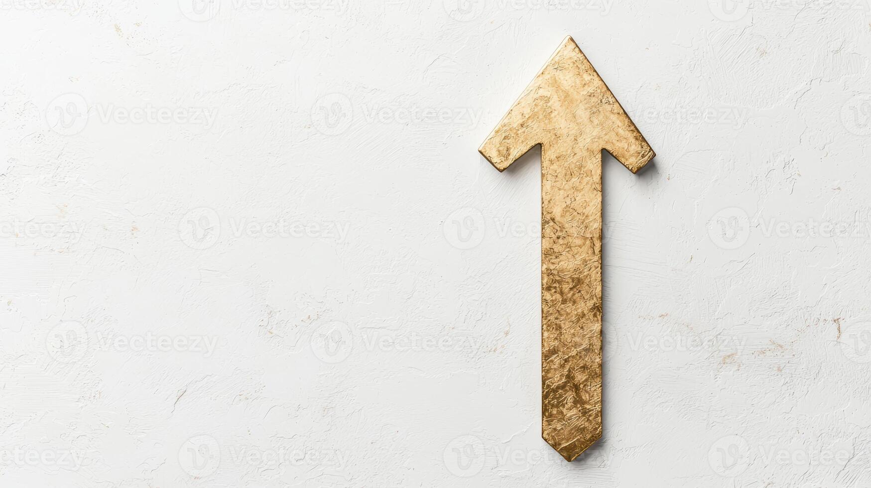 golden arrow pointing up on white background photo