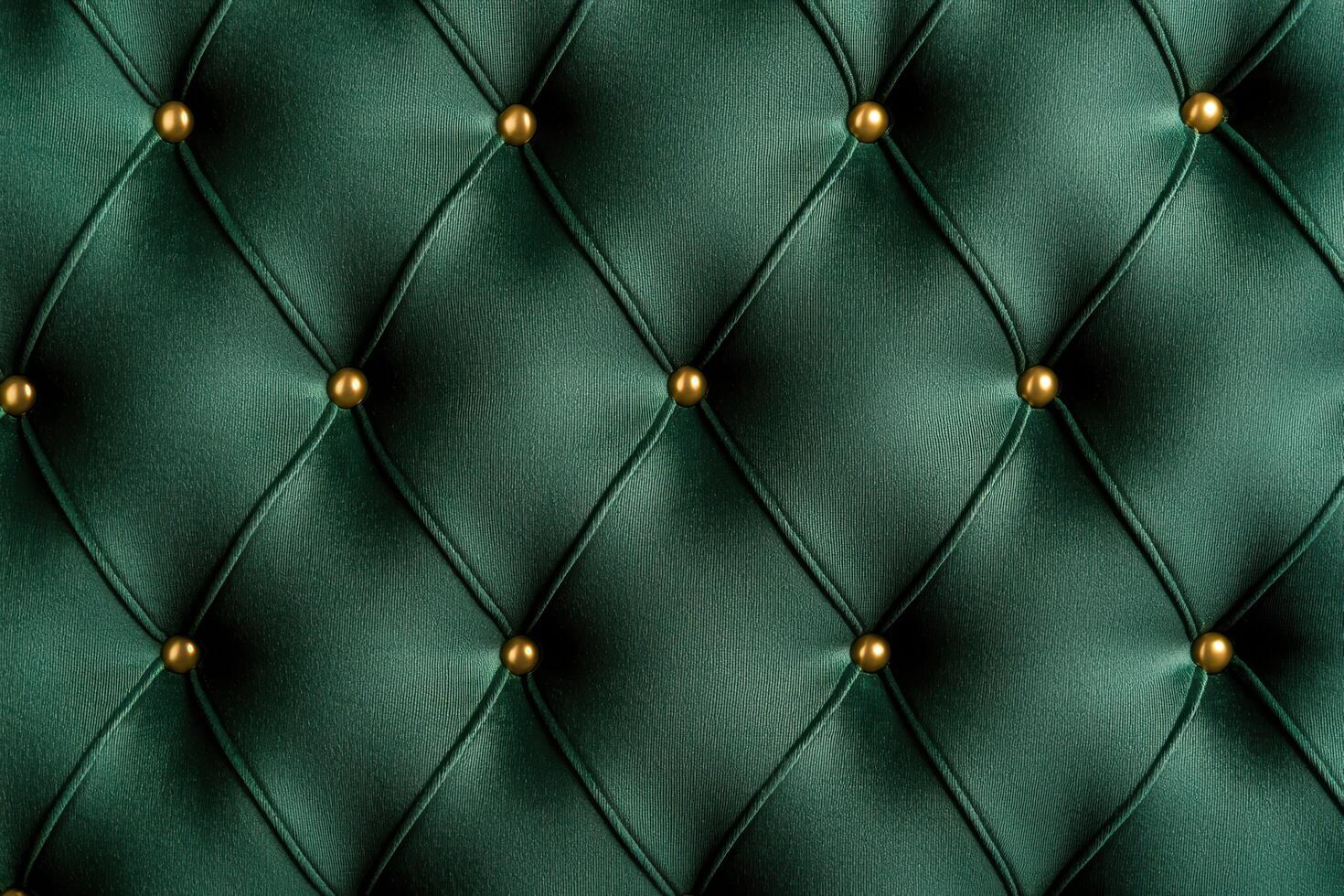 Luxurious green upholstery with golden buttons photo