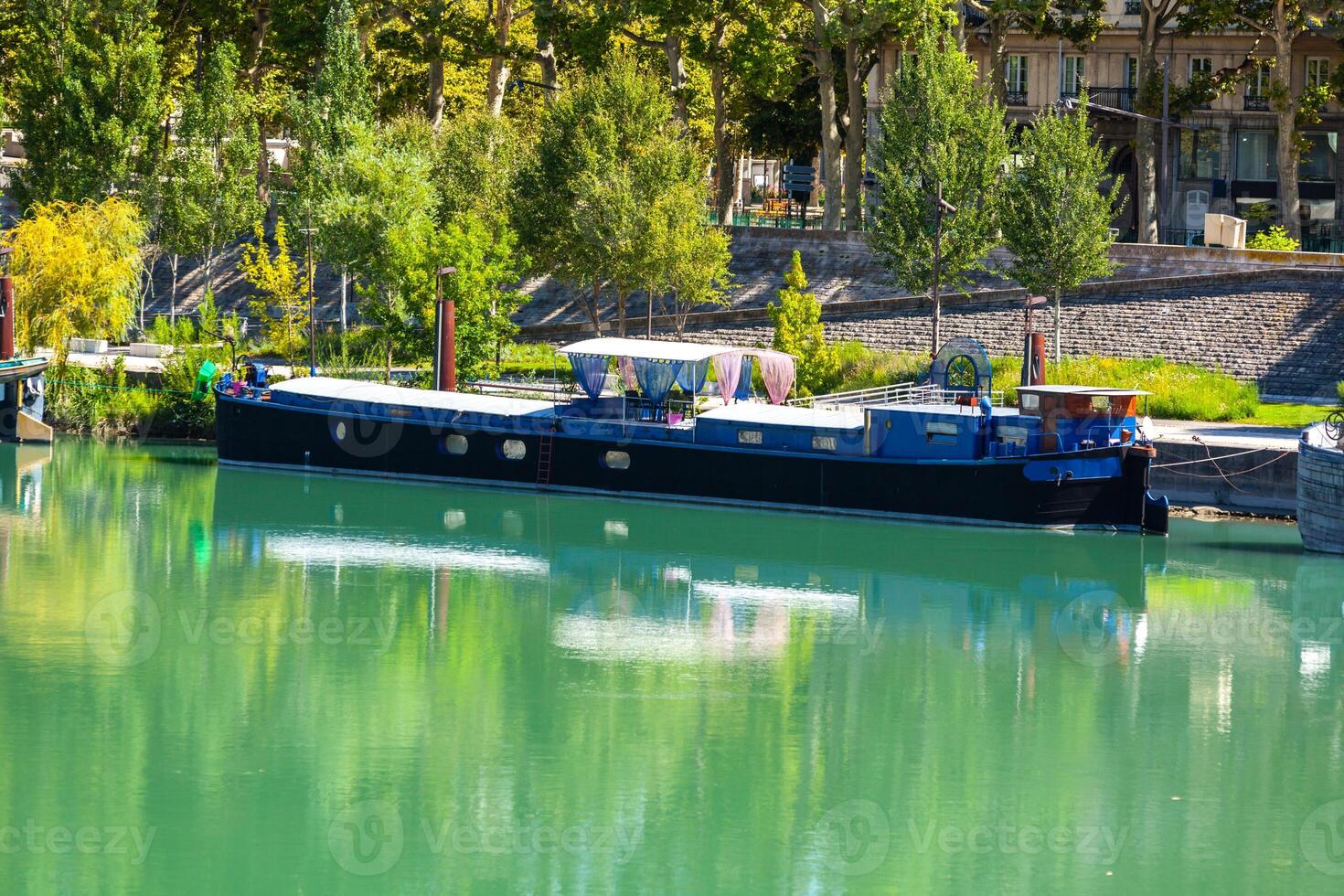 View of houseboats on the river in Lyon, France photo