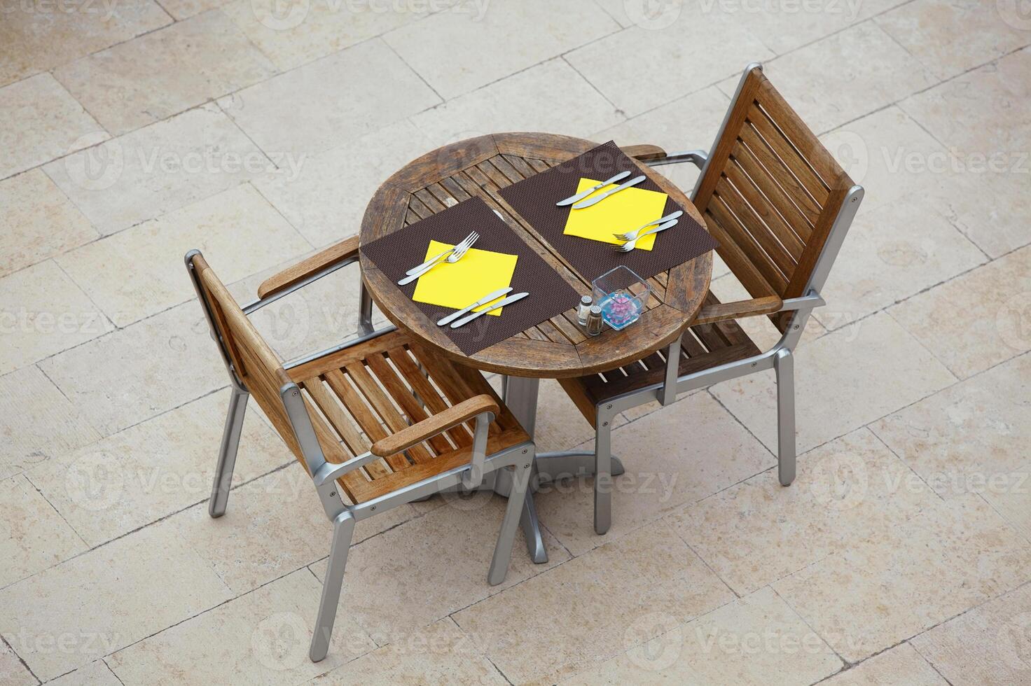 Outdoor summer cafe tables with chairs photo
