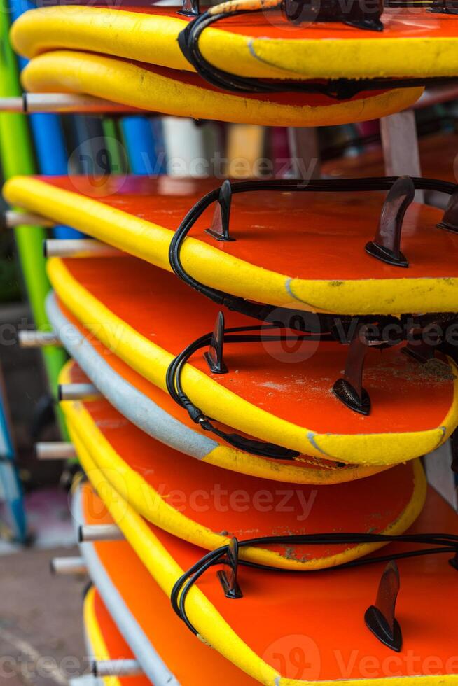Surf boards in a stack photo