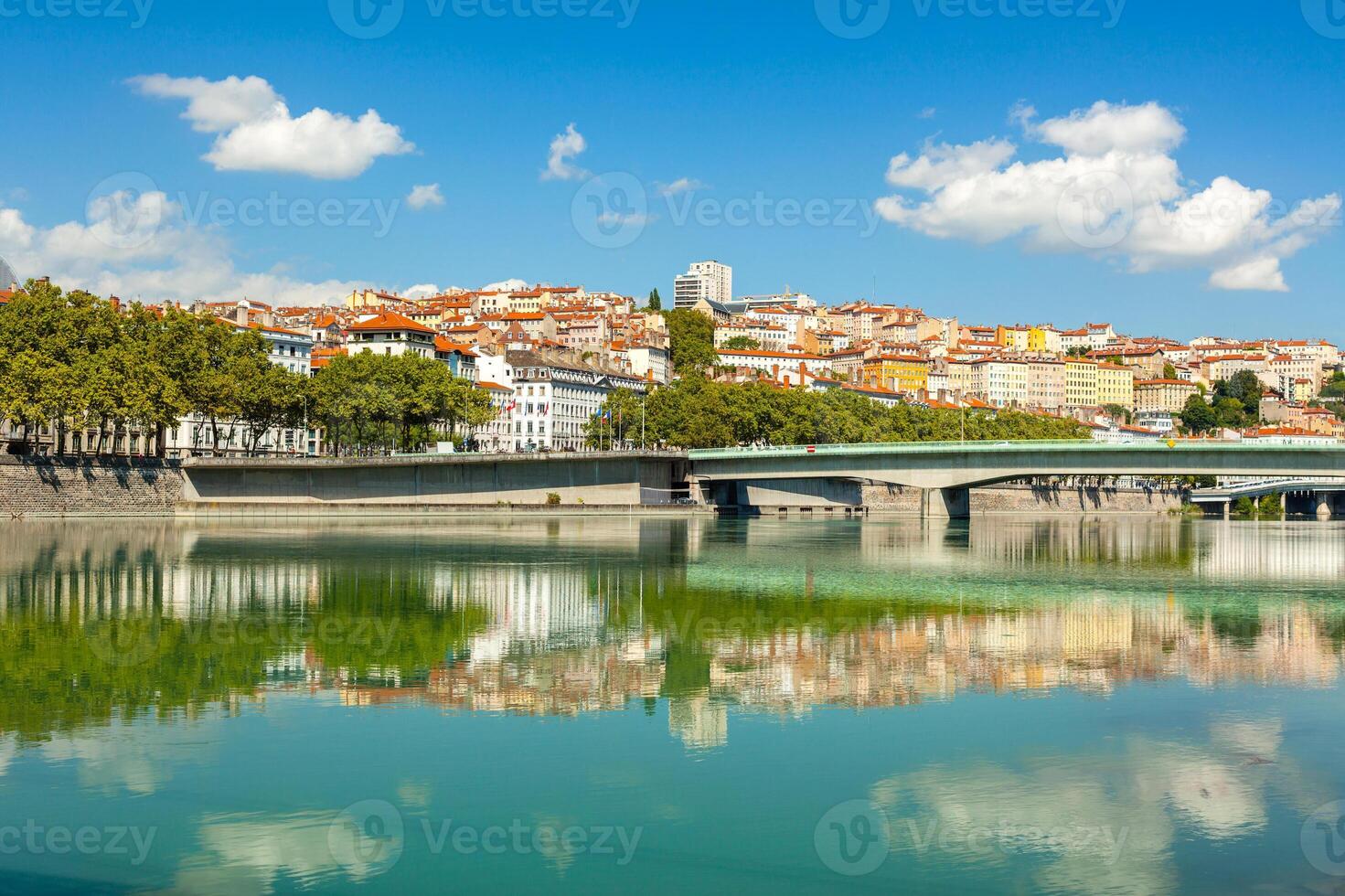 Cityscape of Lyon, France with reflections in the water photo