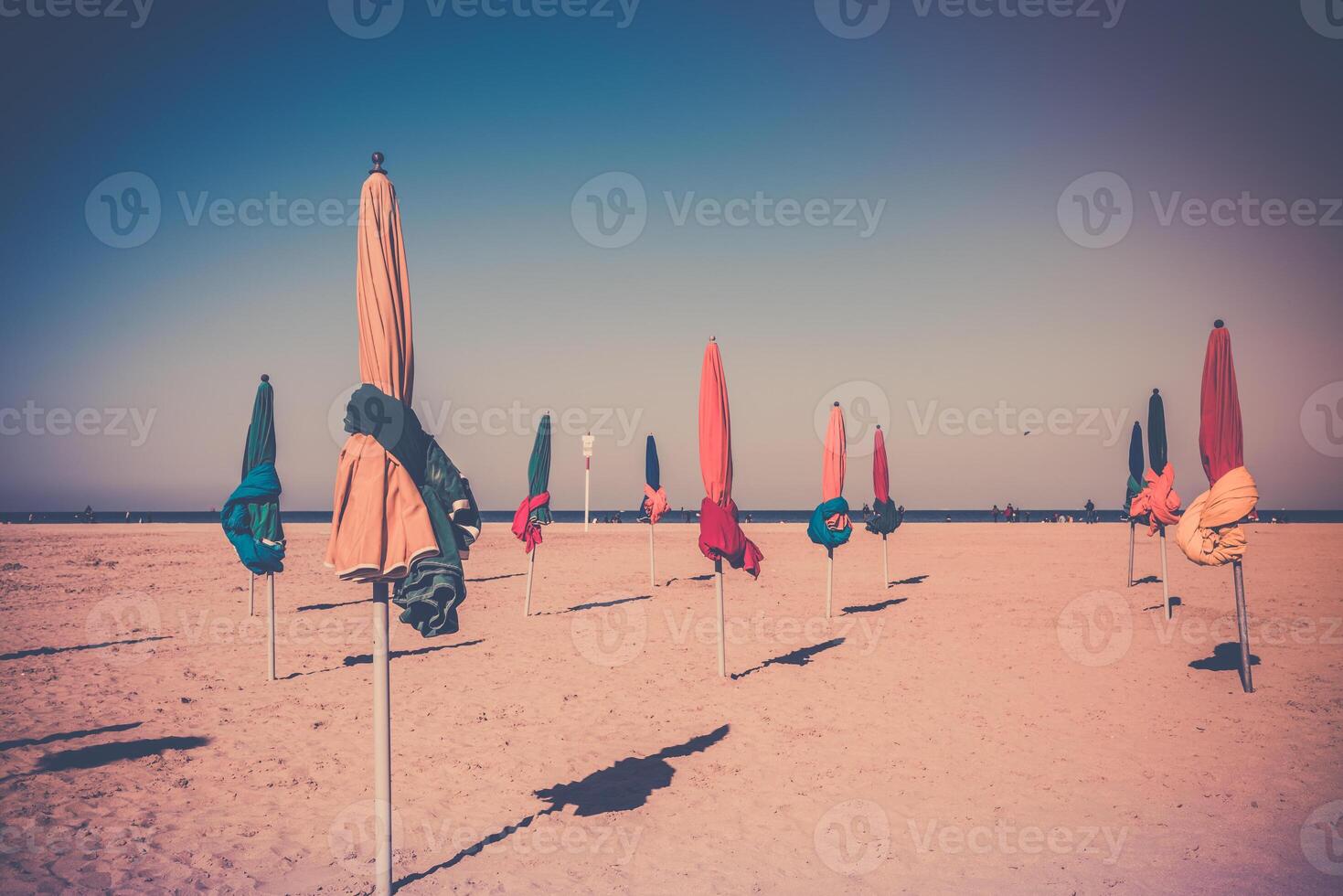 The famous colorful parasols on Deauville beach photo