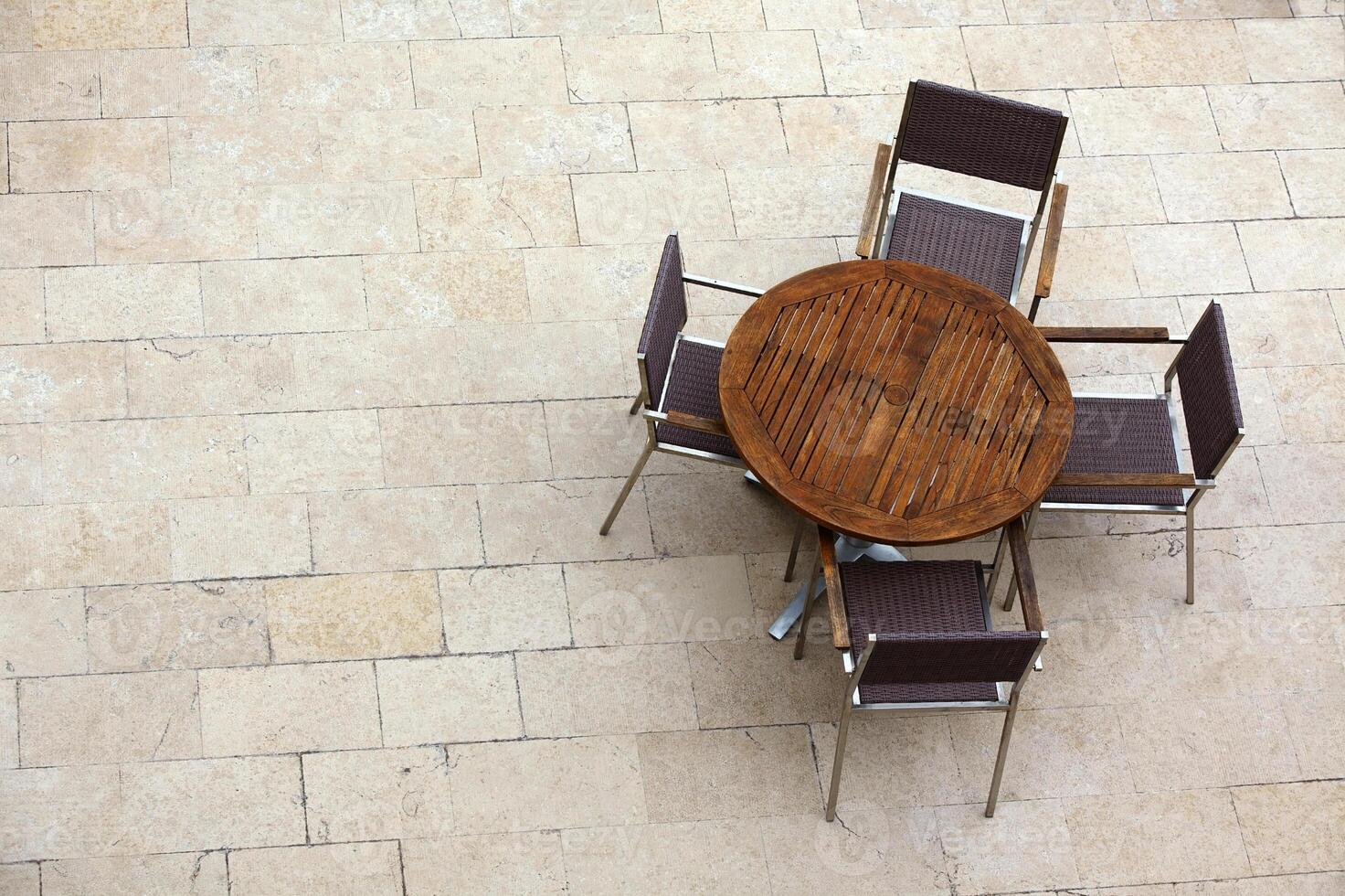 Outdoor summer cafe tables with chairs photo