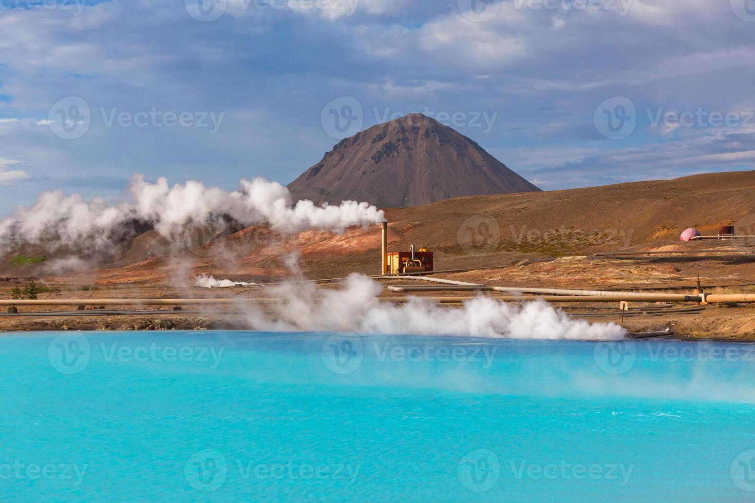 Geothermal Power Station and Bright Turquoise Lake in Iceland photo