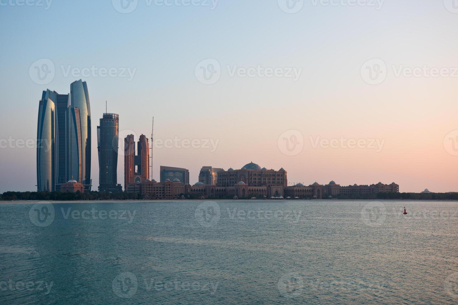 Abu Dhabi buildings skyline from the sea photo