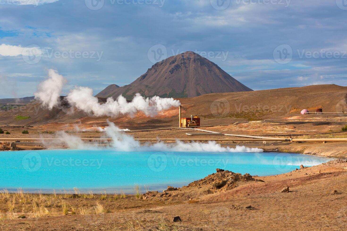 Geothermal Power Station and Bright Turquoise Lake in Iceland photo
