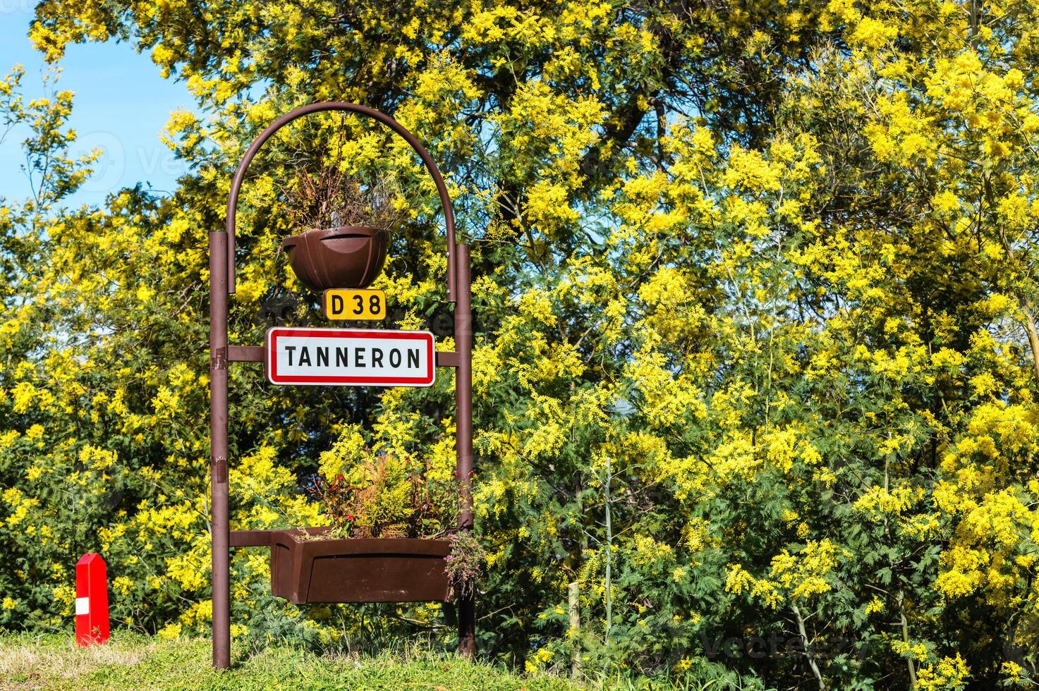 Road sign of Tanneron, France photo