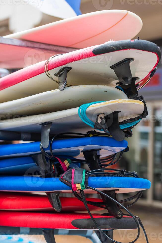 Surf boards in a stack photo
