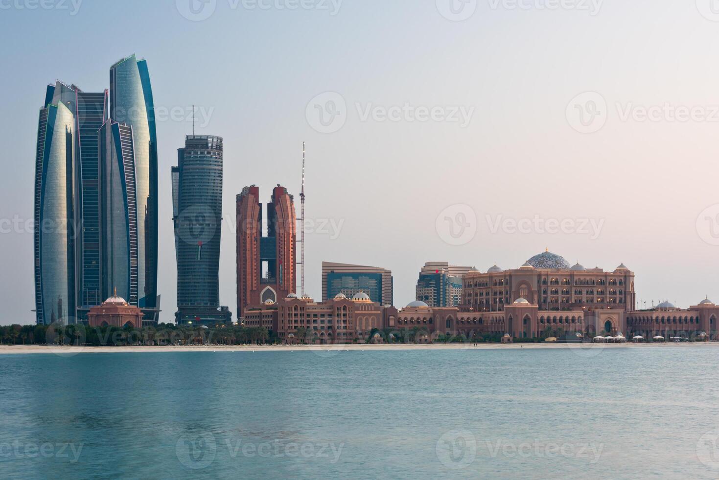 Abu Dhabi buildings skyline from the sea photo