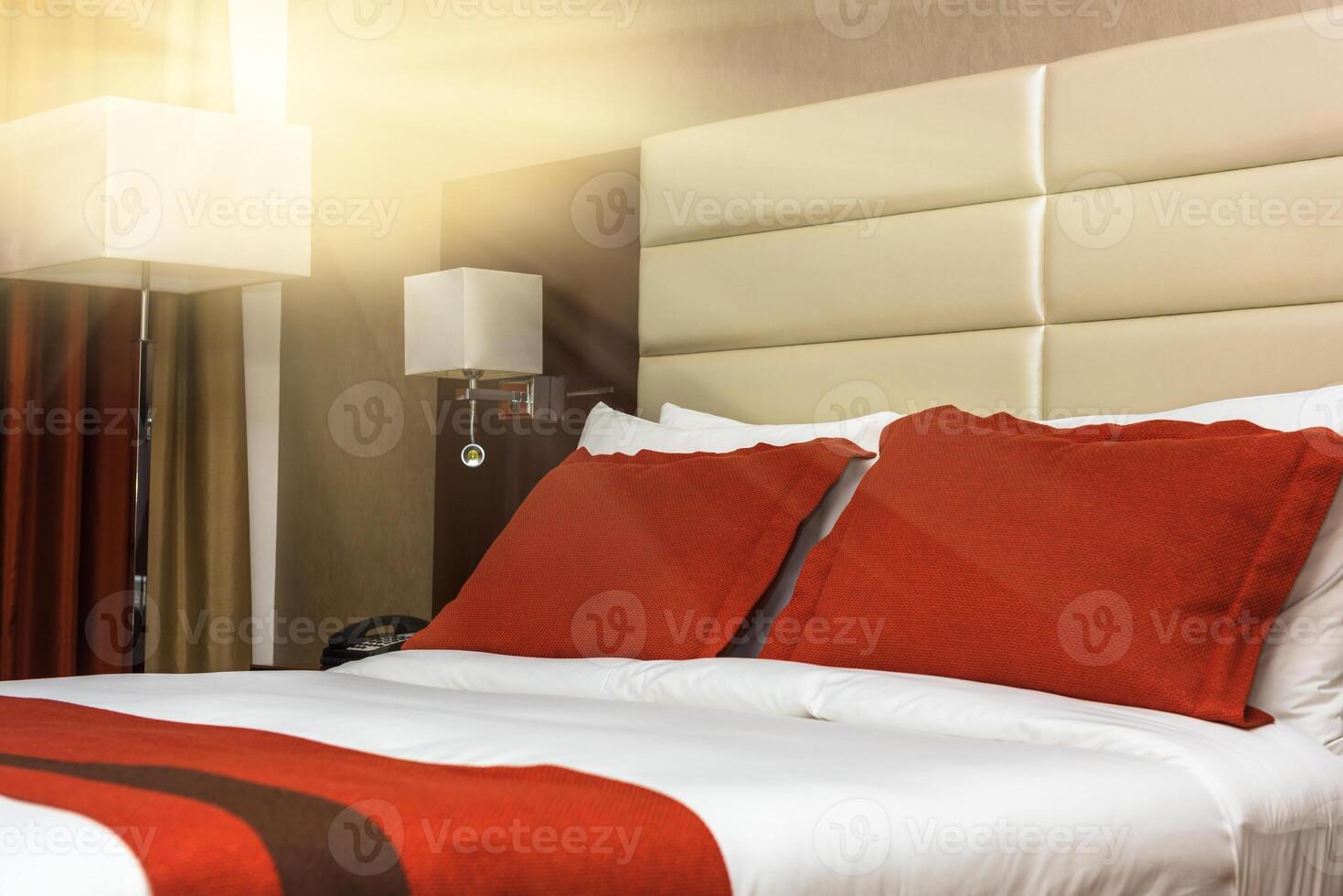 Hotel room with a prepared fresh bed photo