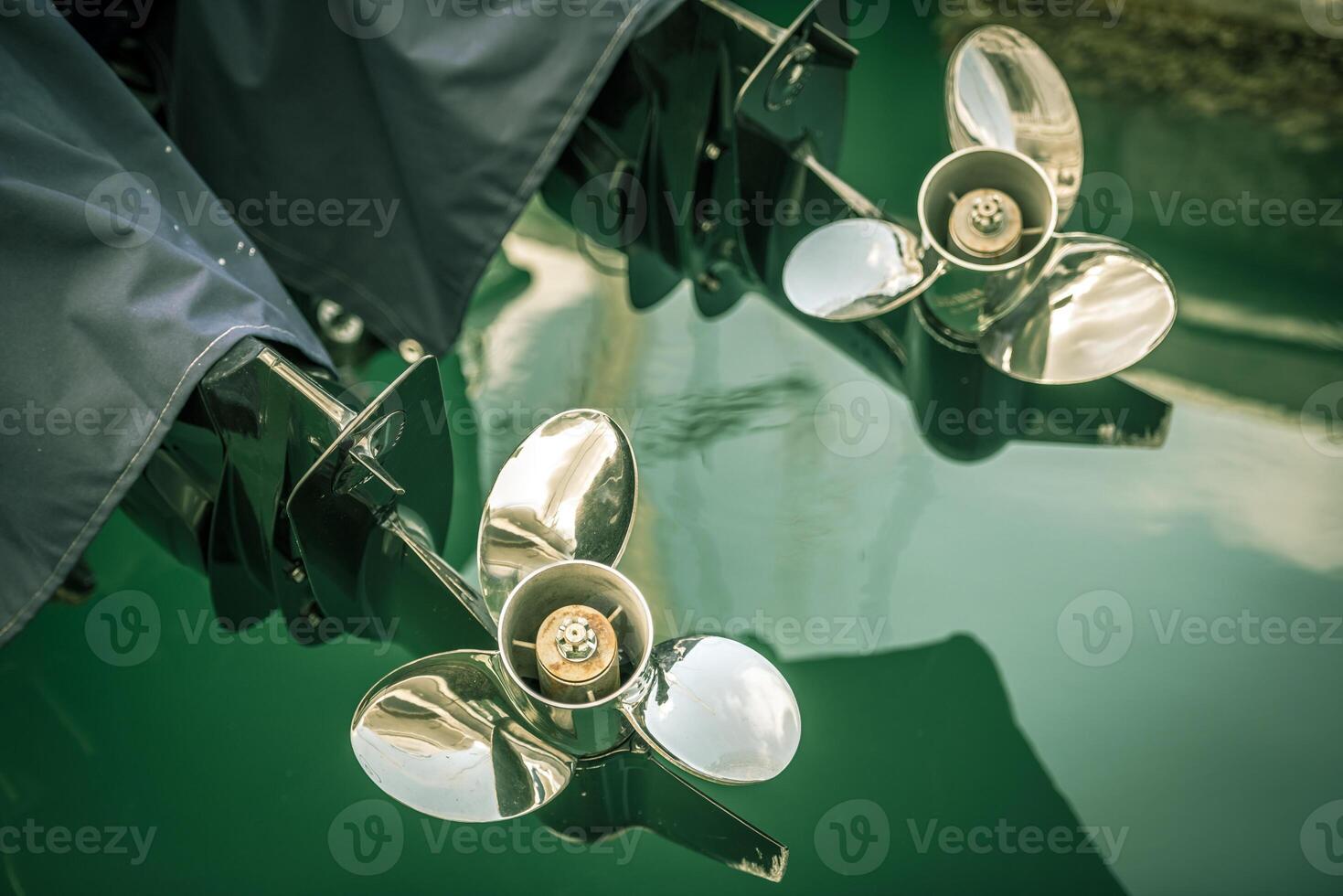 two boat engine with propeller details shot photo