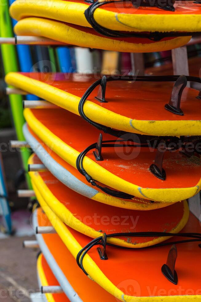 Surf boards in a stack photo