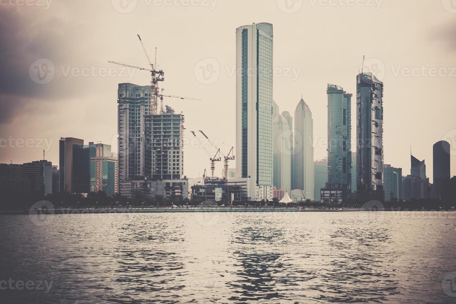 Abu Dhabi buildings skyline from the sea photo