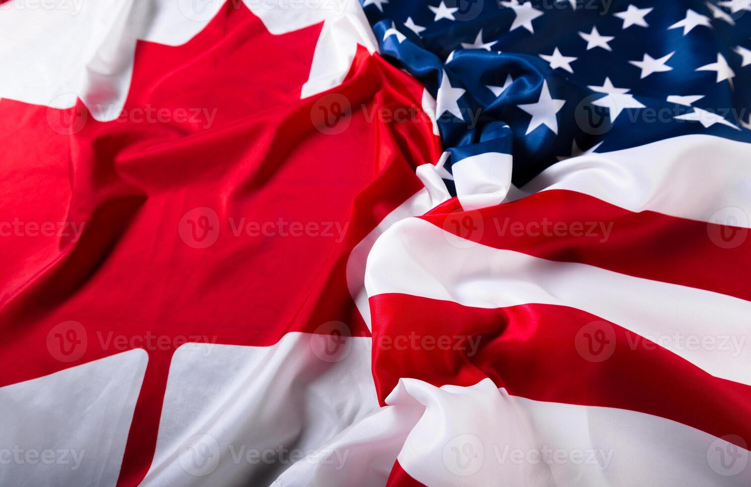 American and Canadian flags together photo