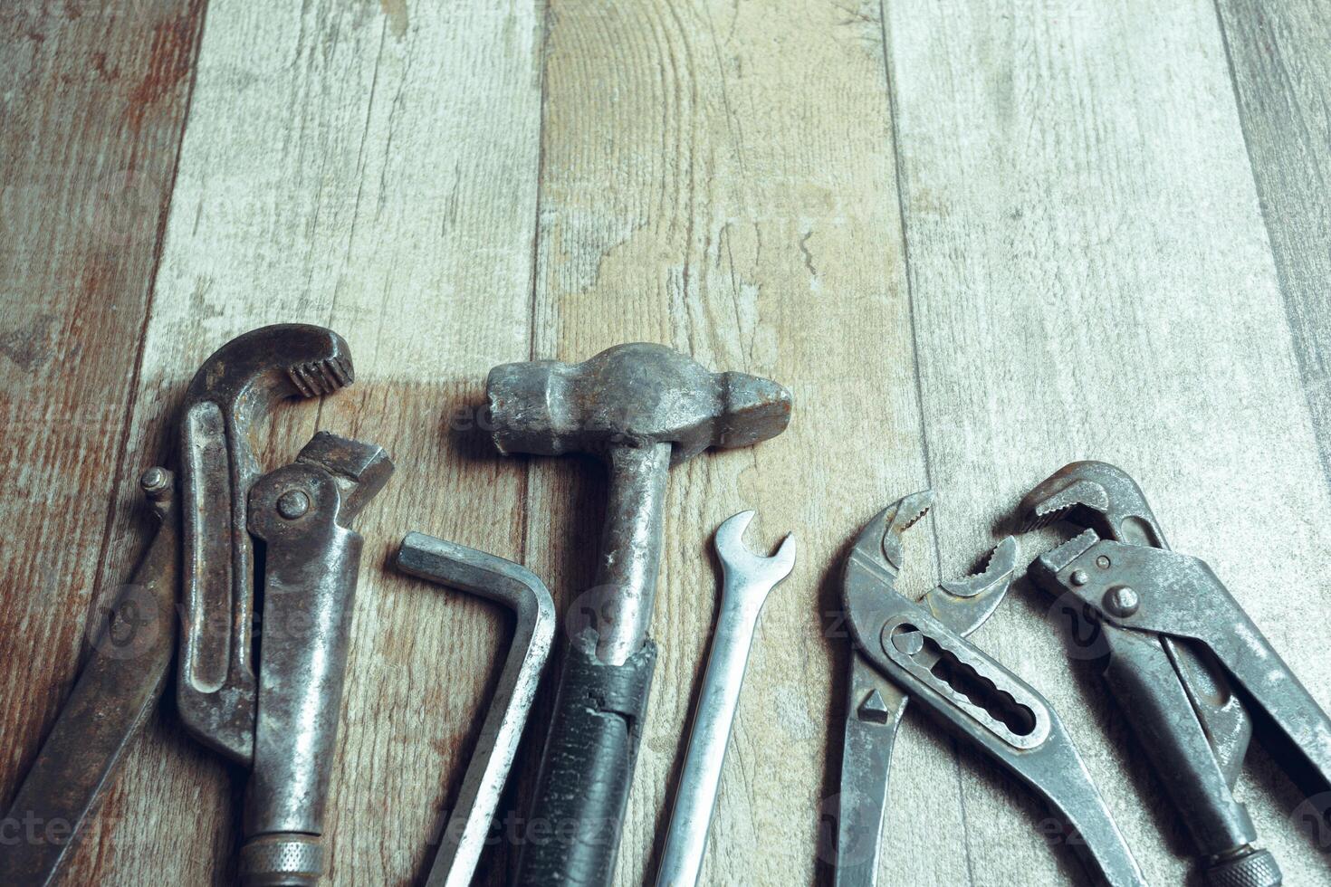 Working tools on wooden rustic background. top view photo