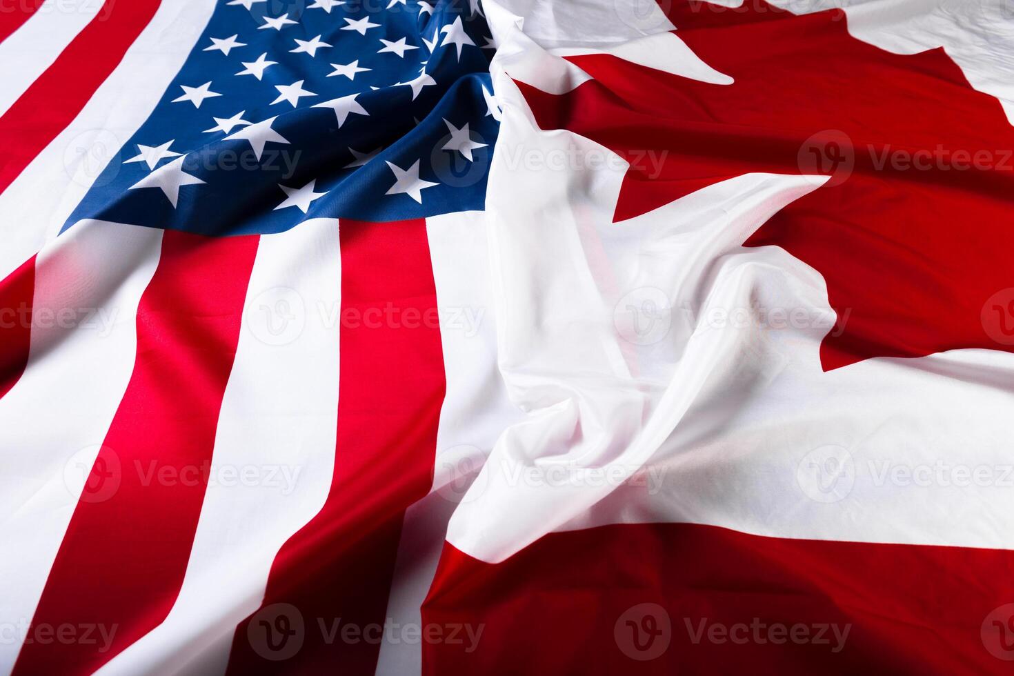American and Canadian flags together photo