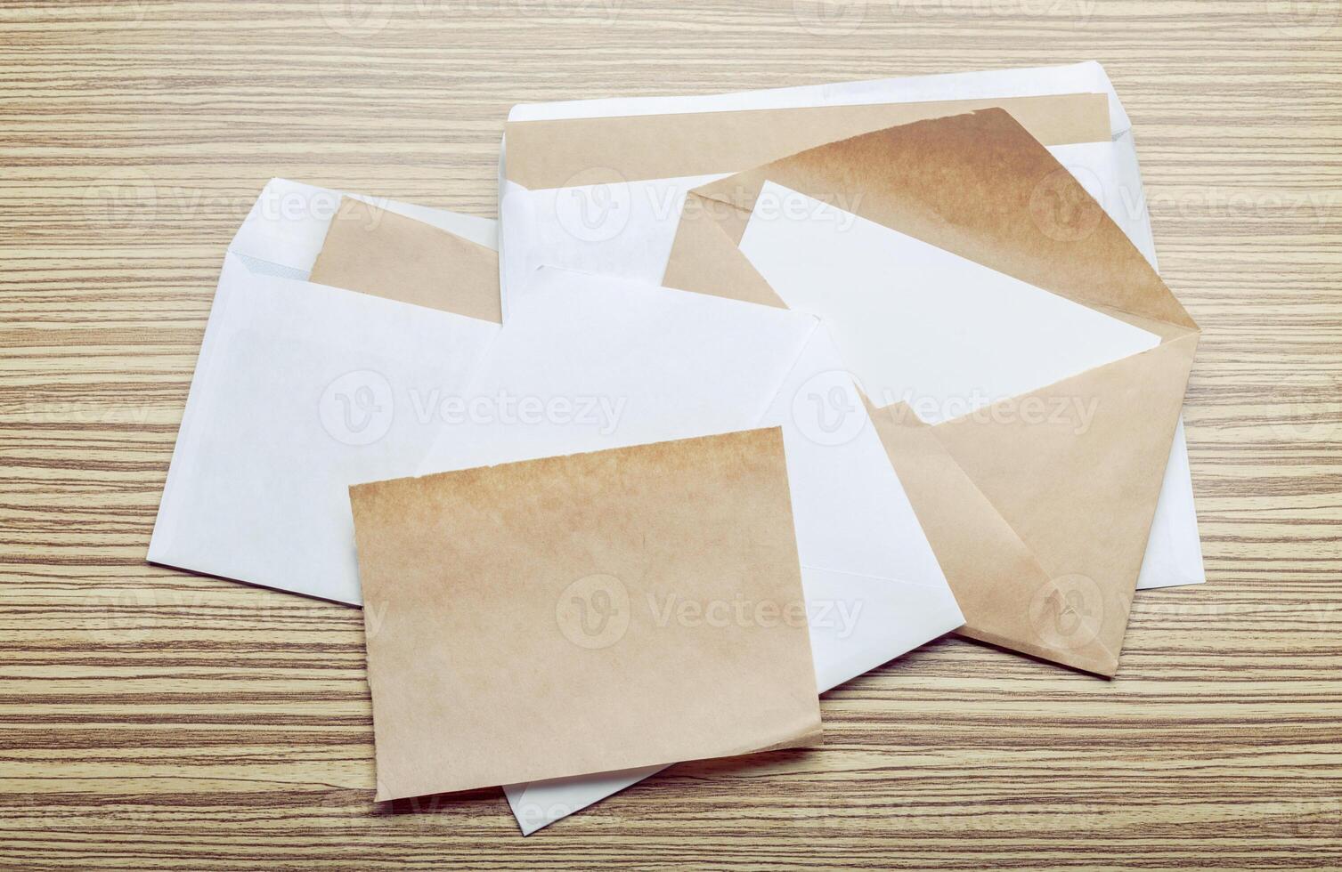 Photo of blank envelope on a wooden background