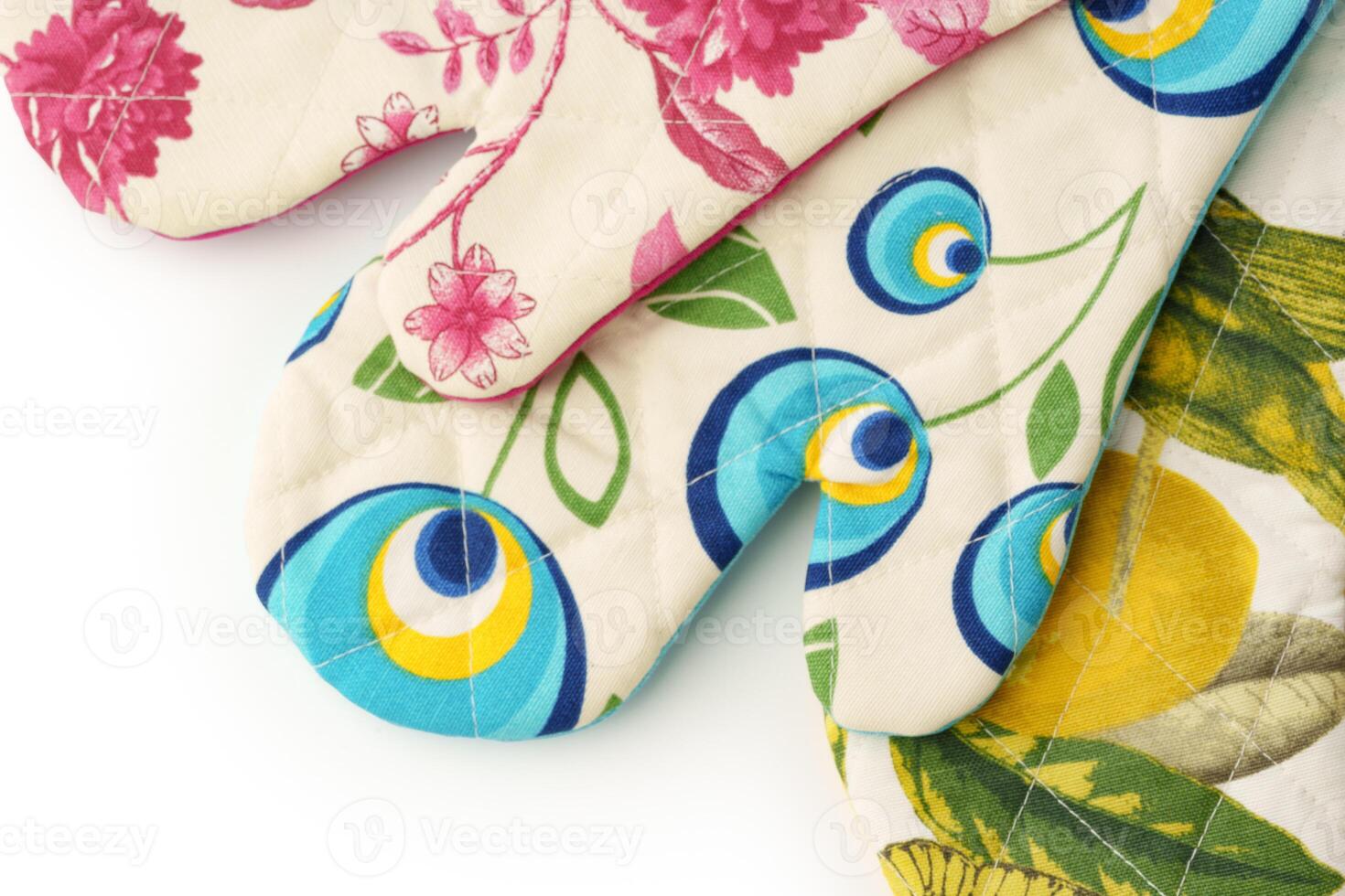 Colorful Printed Oven Mitts Isolated on White Background photo