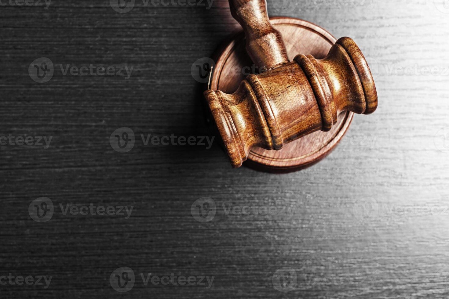 Judge's Gavel over black background photo