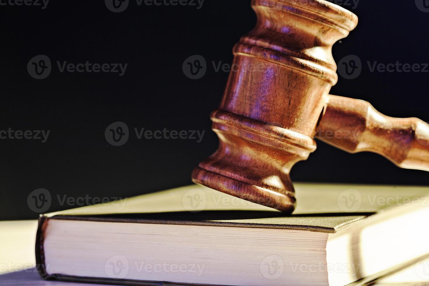 Judge's Gavel over black background photo