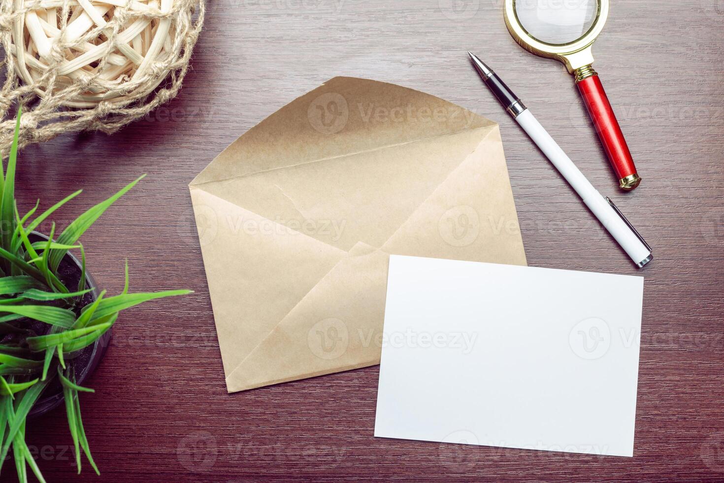 Photo of blank envelope on a wooden background