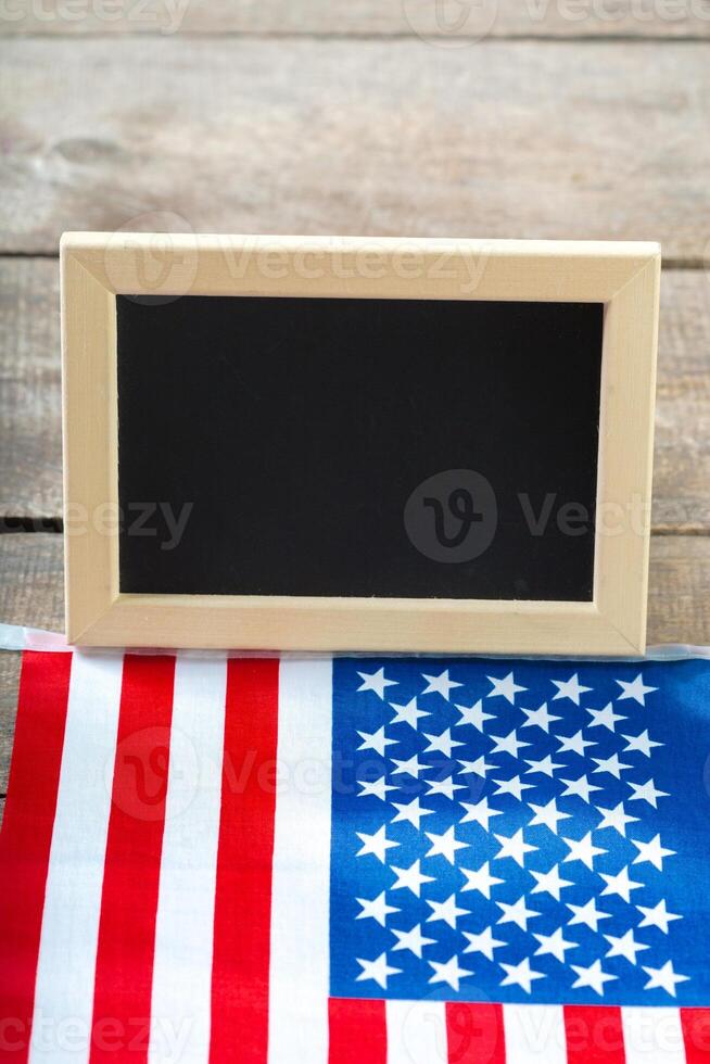 Blank chalk board with American Flag photo