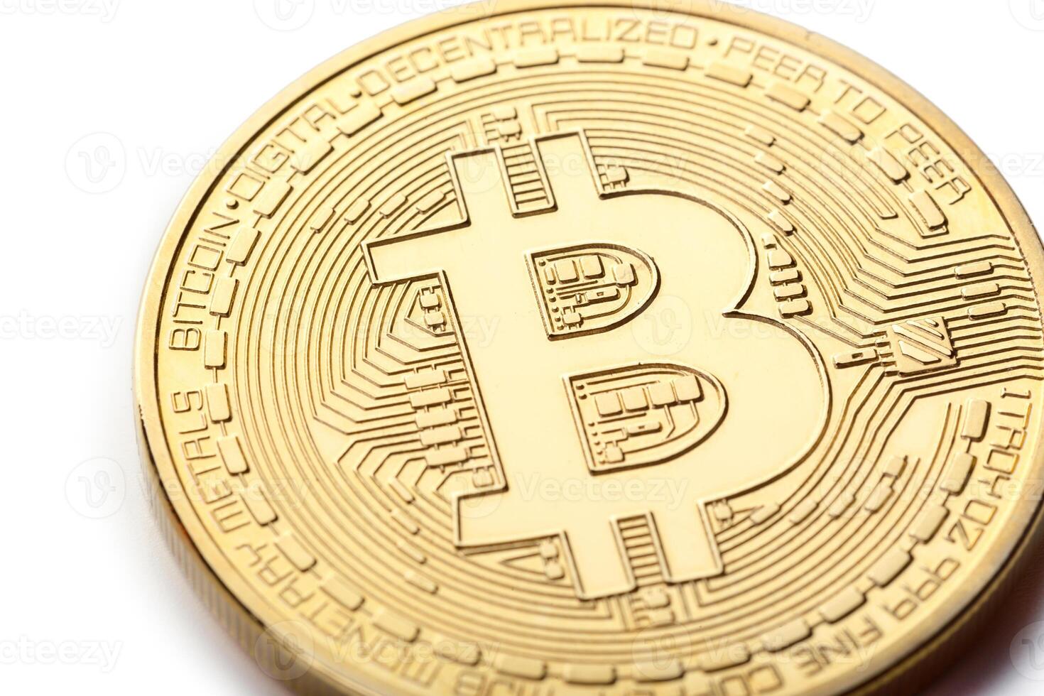 Golden Bitcoin coin isolated on white photo