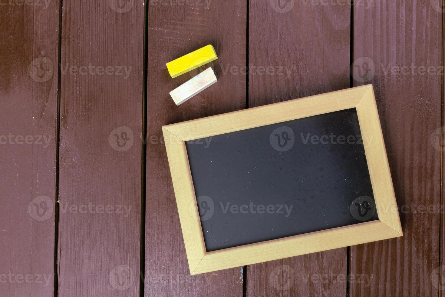 Small wooden framed blank blackboard for your design photo