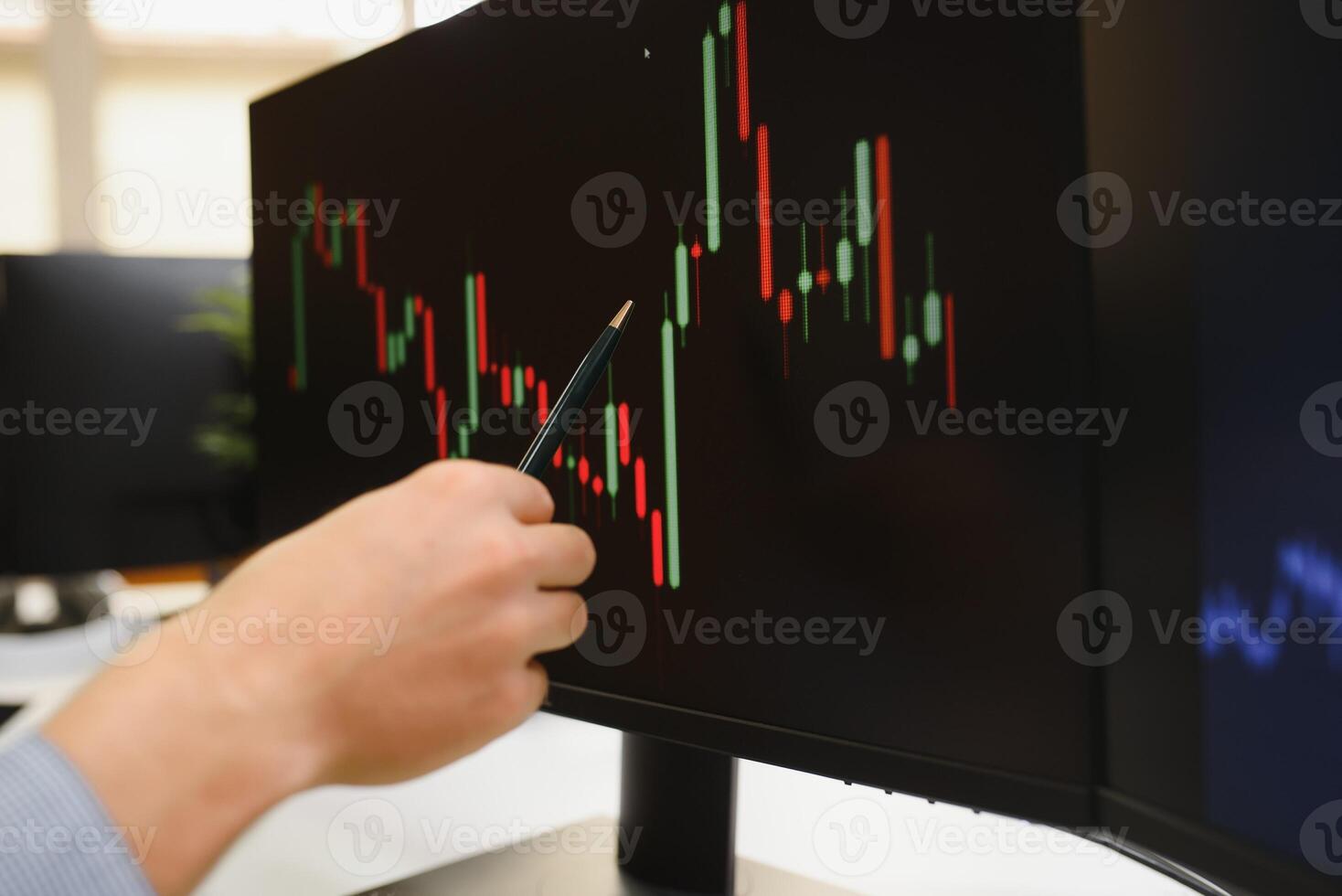 Team of stockbrokers Discussing with display screens Analyzing data, graphs and reports of stock market trading for investment photo