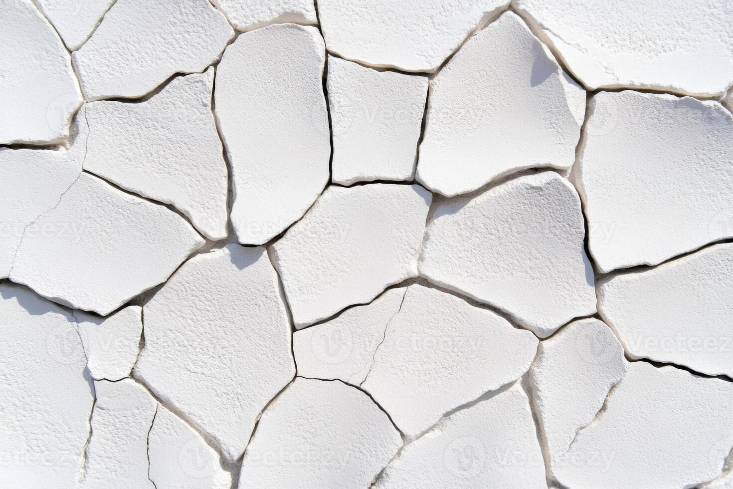 Close-up of rough organic stone texture showcasing cracks and intricate details under soft lighting photo