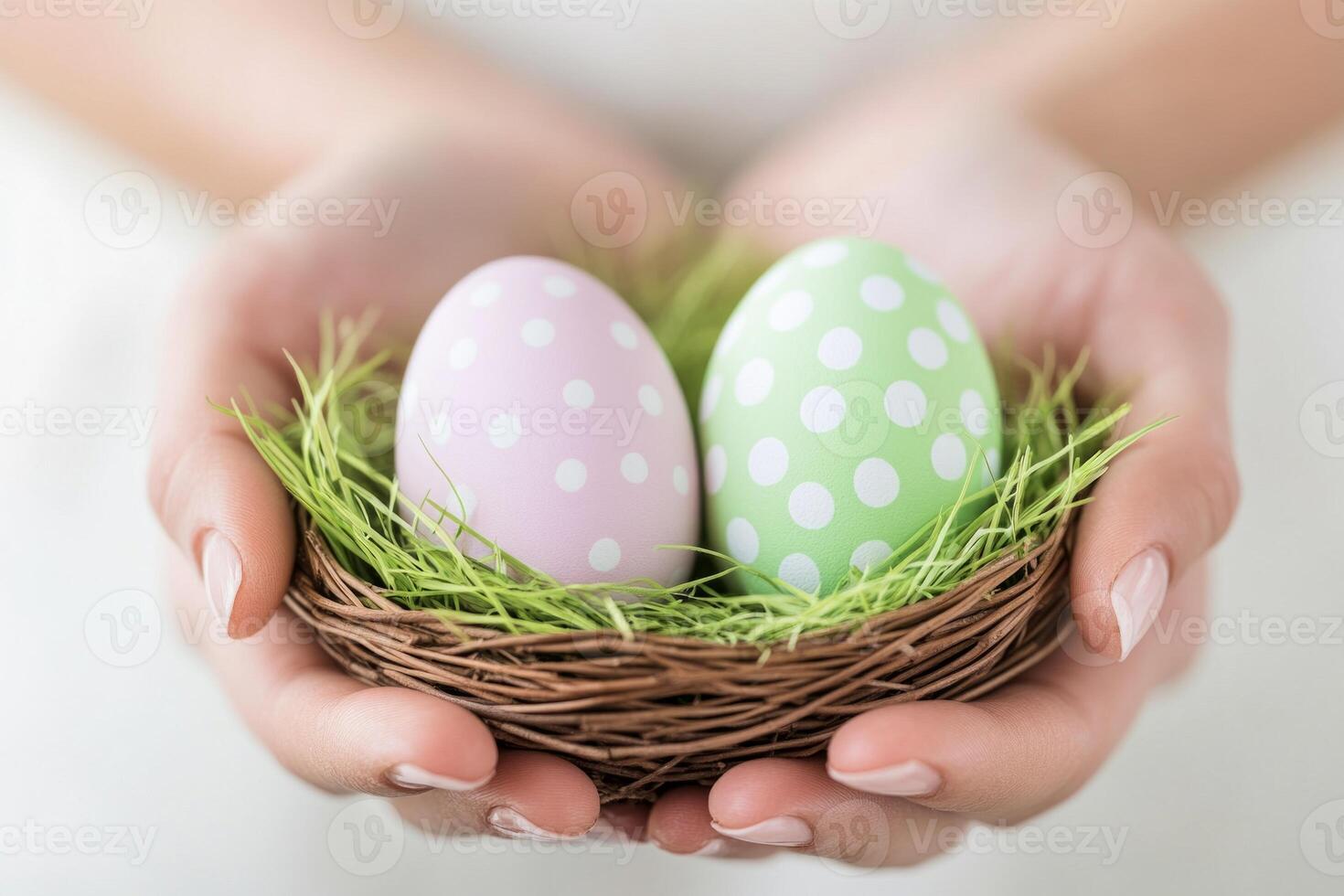 Brightly colored Easter eggs in a wicker nest held in hands, celebrating a joyful holiday moment photo