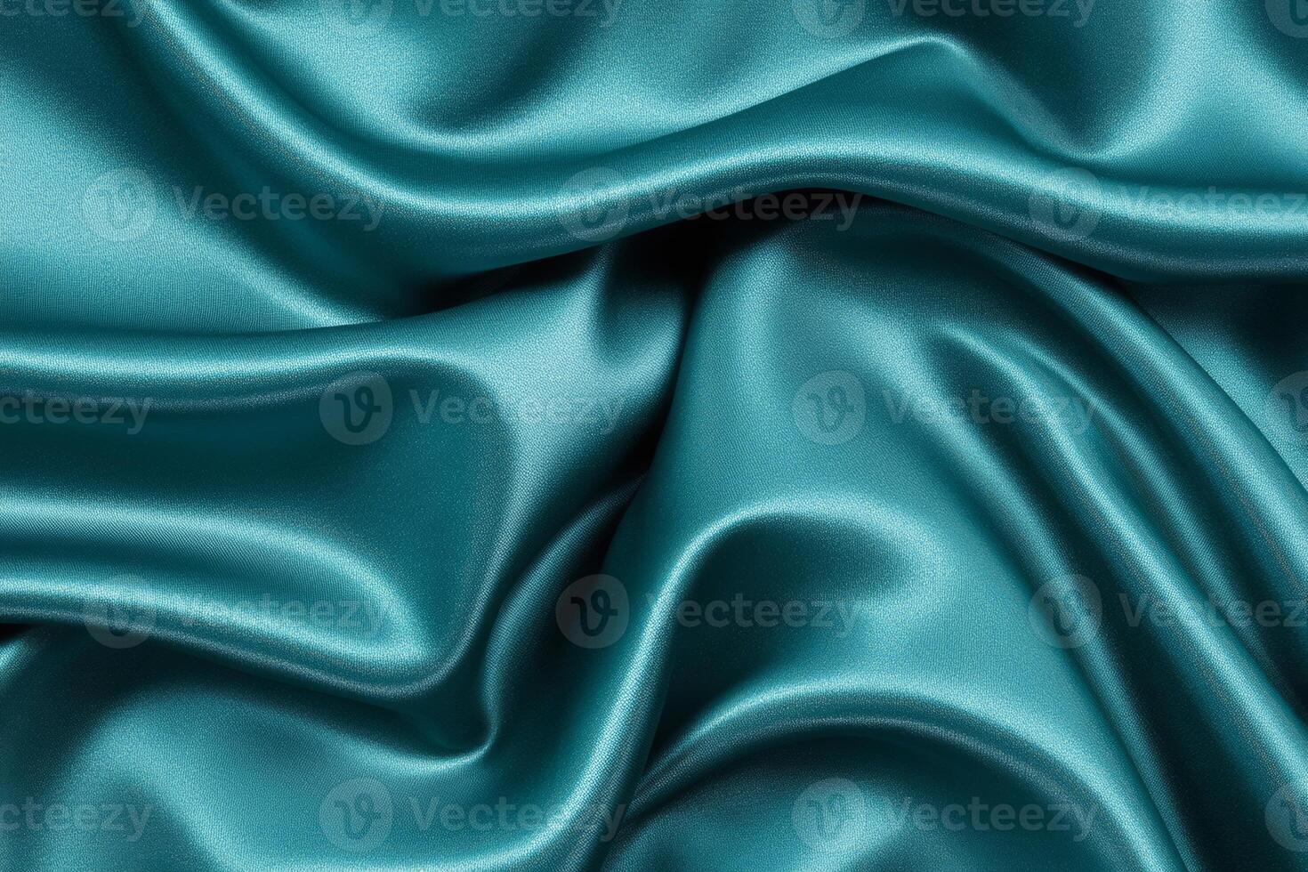 Textured close-up of dark teal velvet fabric with rich color and luxurious softness photo
