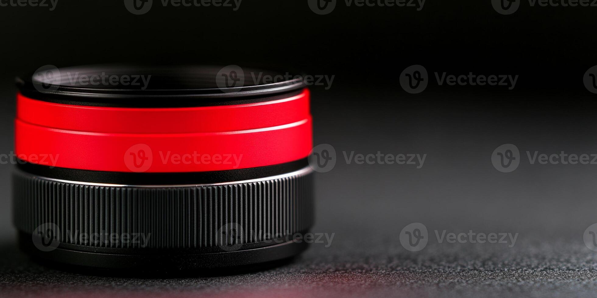 Close-up view of a macro lens featuring a bold red filter emphasizing intricate details photo