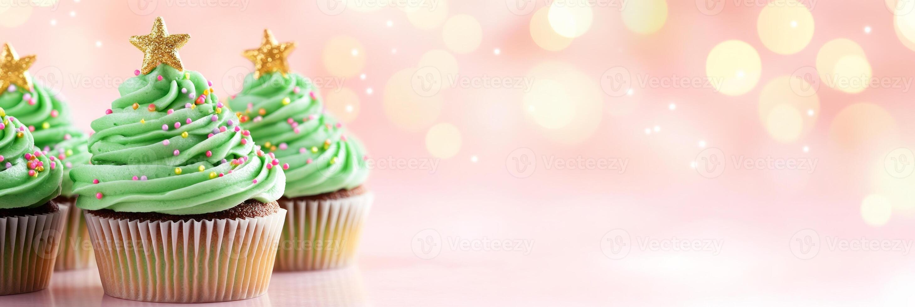 Festive Christmas tree cupcakes with green icing and edible stars for holiday celebrations photo
