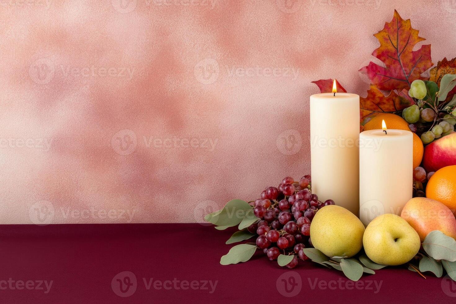 Autumn tablescape with seasonal decor featuring candles and fresh fruits for a festive gathering photo