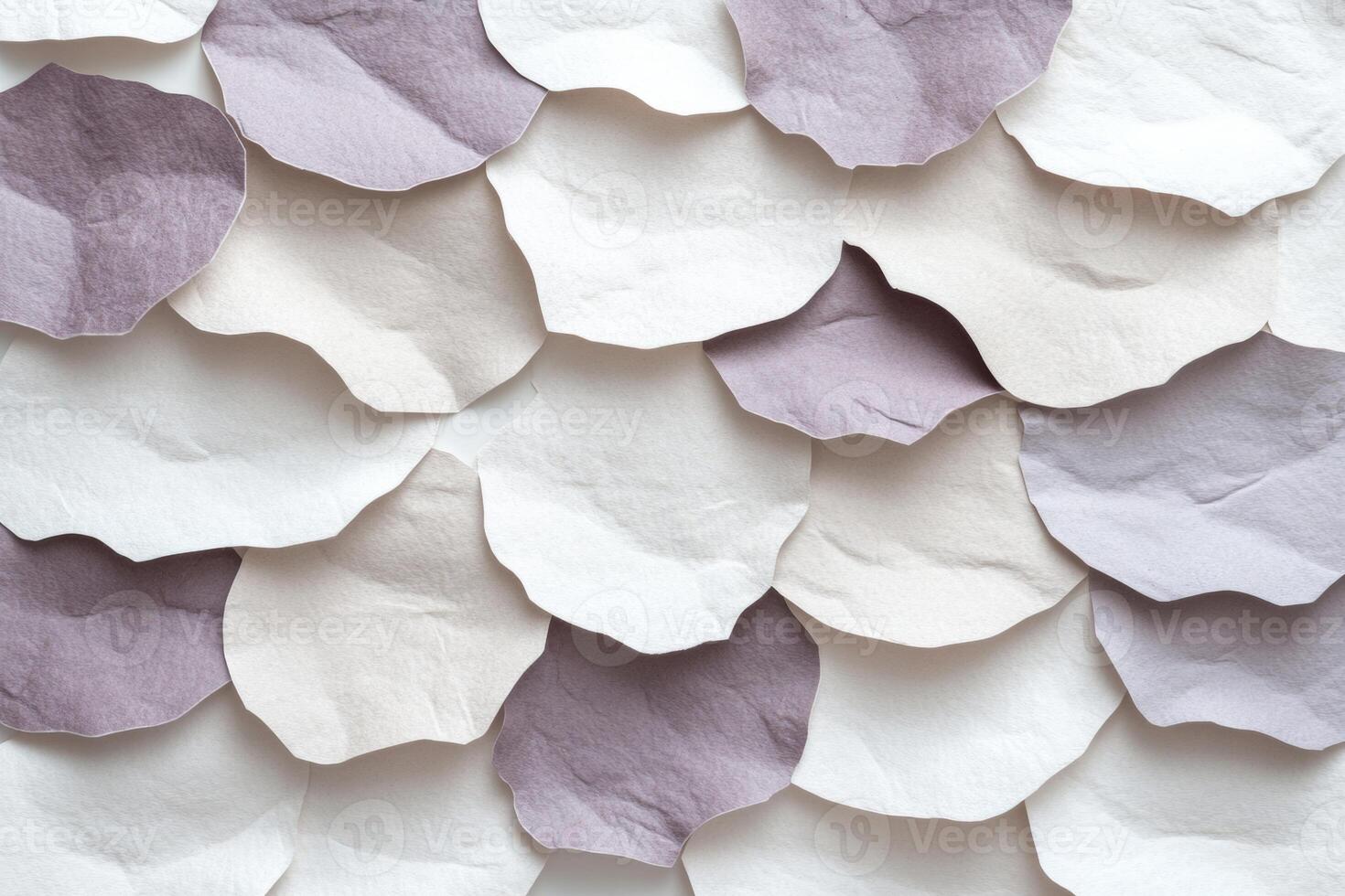 Textured paper in shades of gray and burgundy with a vintage feel illuminated by soft lighting photo