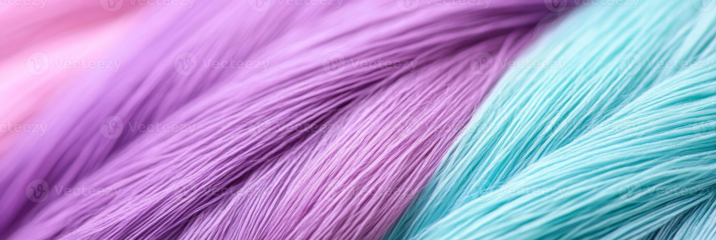 Close-up of soft fabric texture featuring deep violet and mint tones in calming, natural lighting photo