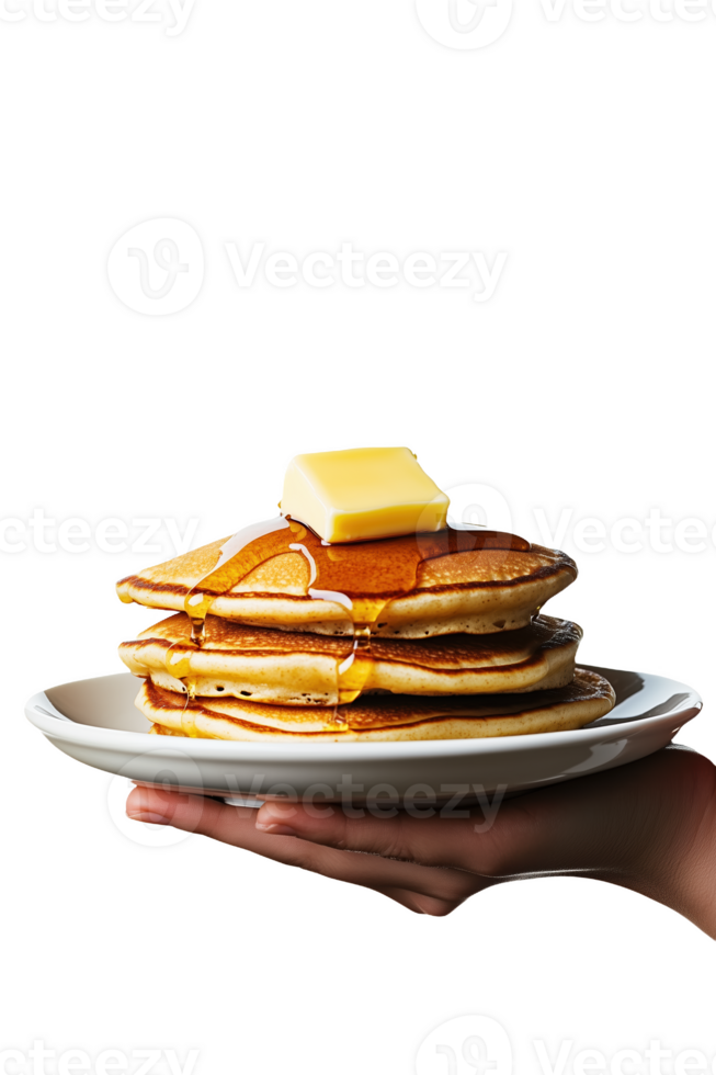 A person holds a plate of pancakes topped with butter and syrup in a bright setting png