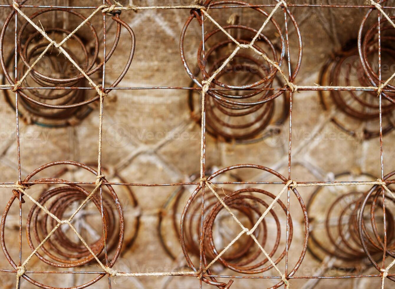 Abstract grunge-style background with metal mesh and coarse fabric photo