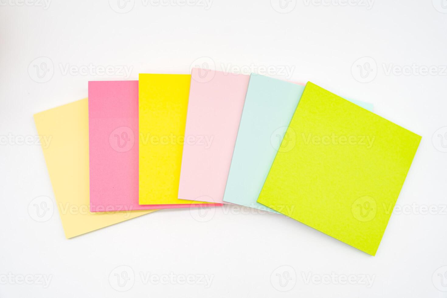 Blank colorful sticky note isolated on white background. Copy space photo