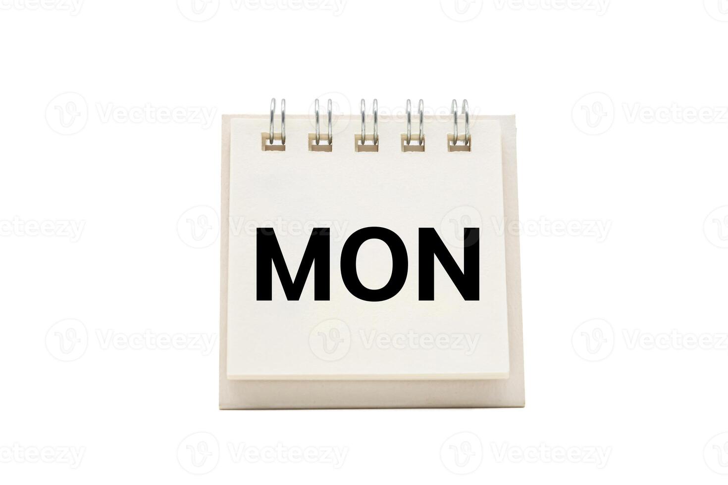 MON text on desk calendar with clipping path isolated on white background. MONDAY and Calendar concept photo