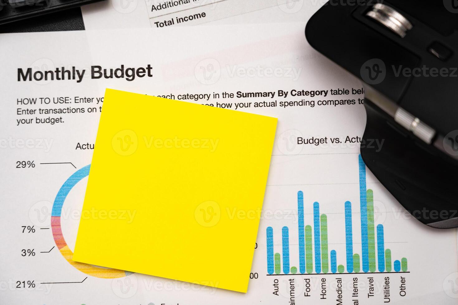 Blank Sticky note with calculator on desk with monthly budget graph. Financial data analyzing. Working on desk with using calculator, finance accounting. Copy space. photo