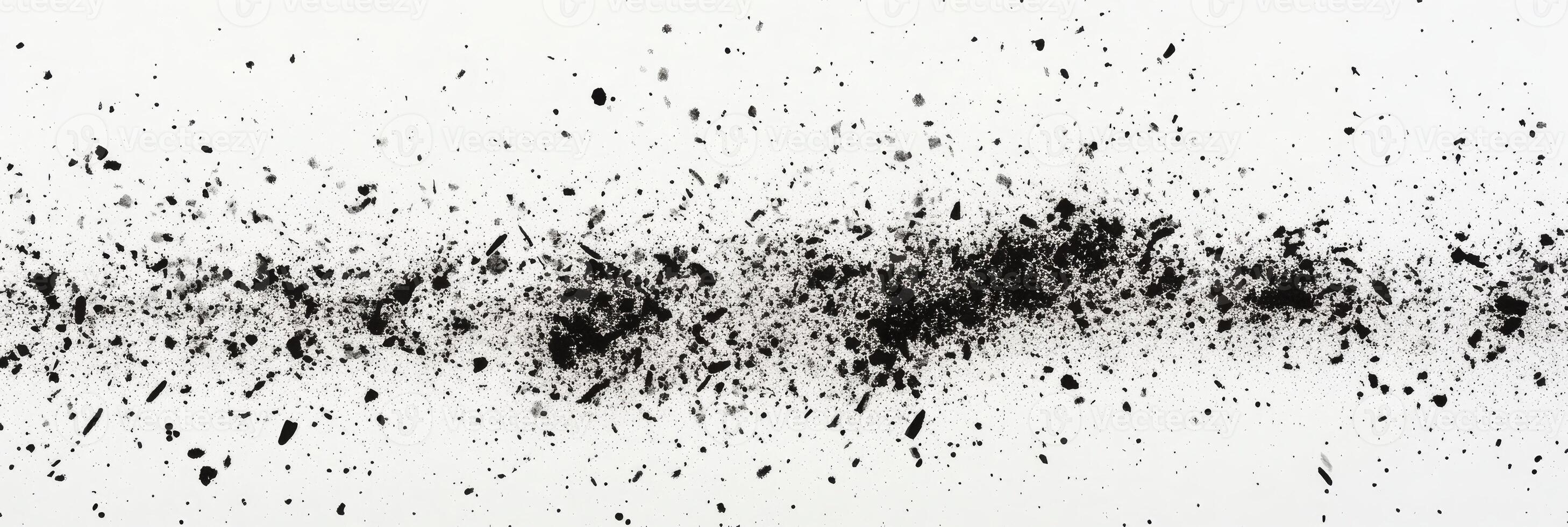 This captivating abstract artwork features an intriguing textured black spray effect, skillfully showcasing a striking gradient of grains and dots set against a clean white background photo