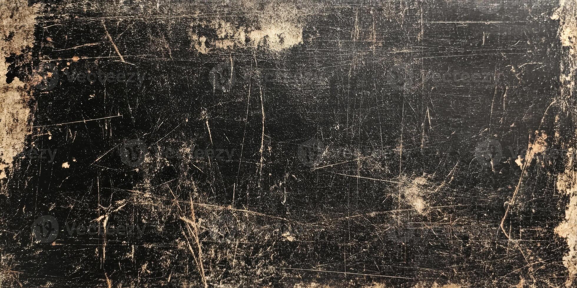 An abstract black surface that closely resembles an old and aged chalkboard, adorned with grunge textures and scratches, making it perfect for diverse design backgrounds and creative projects photo