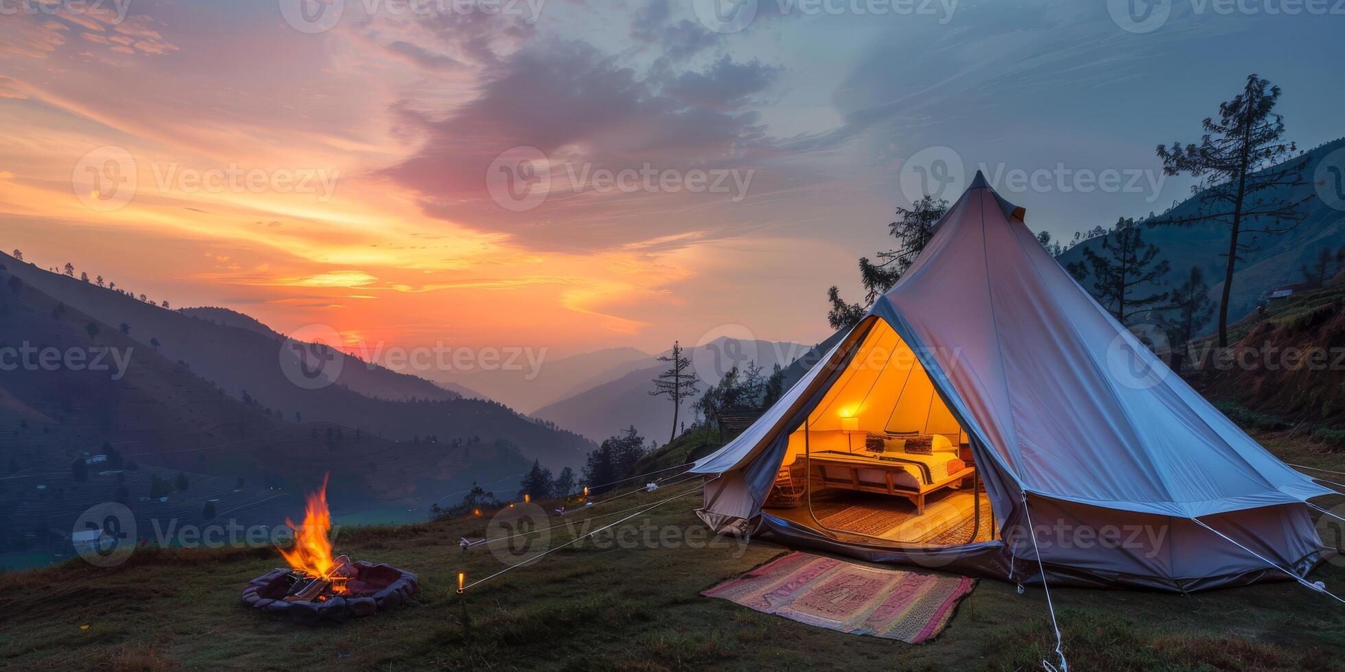 Imagine a cozy glamping setup with a tent and warm campfire, set against a stunning sunset backdrop photo