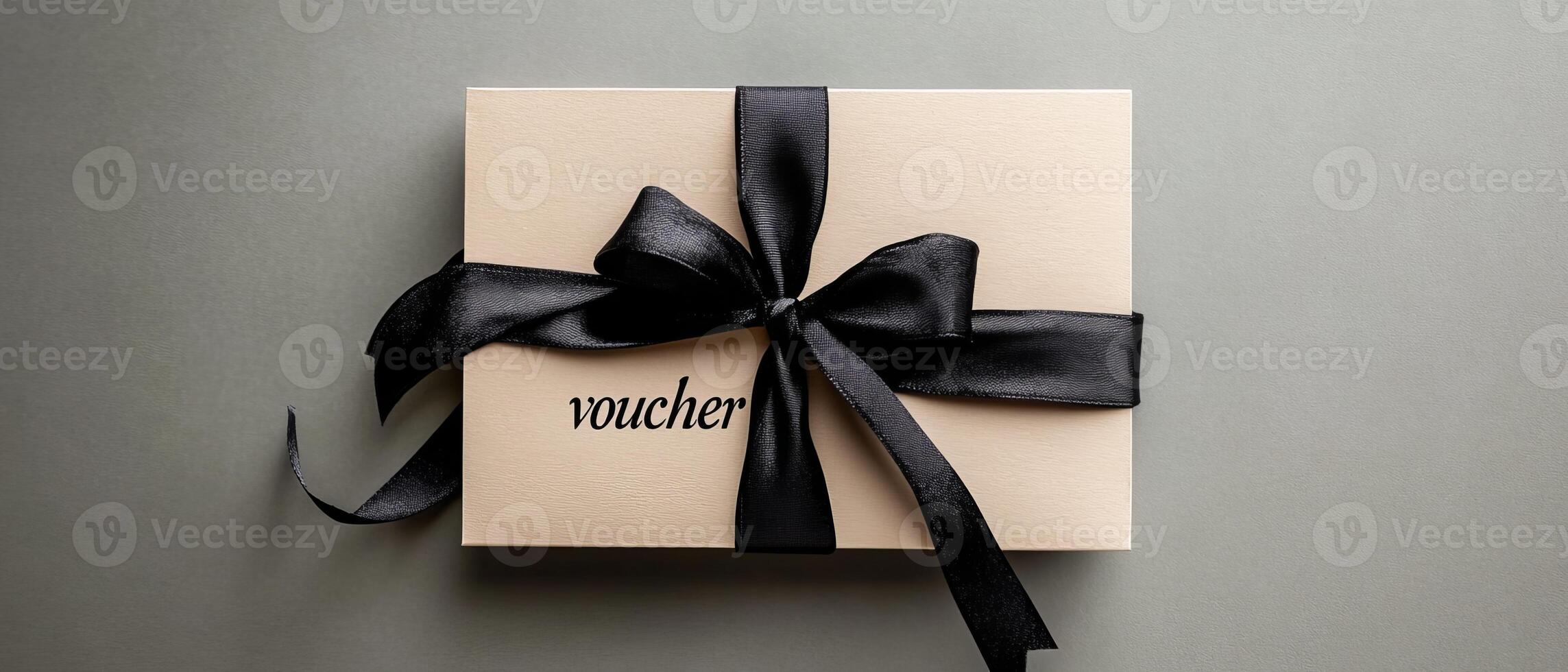 Discover this sophisticated and beautifully crafted gift voucher, elegantly adorned with a sleek black ribbon, making it perfect for any special occasion, celebration, or heartfelt moment in life photo